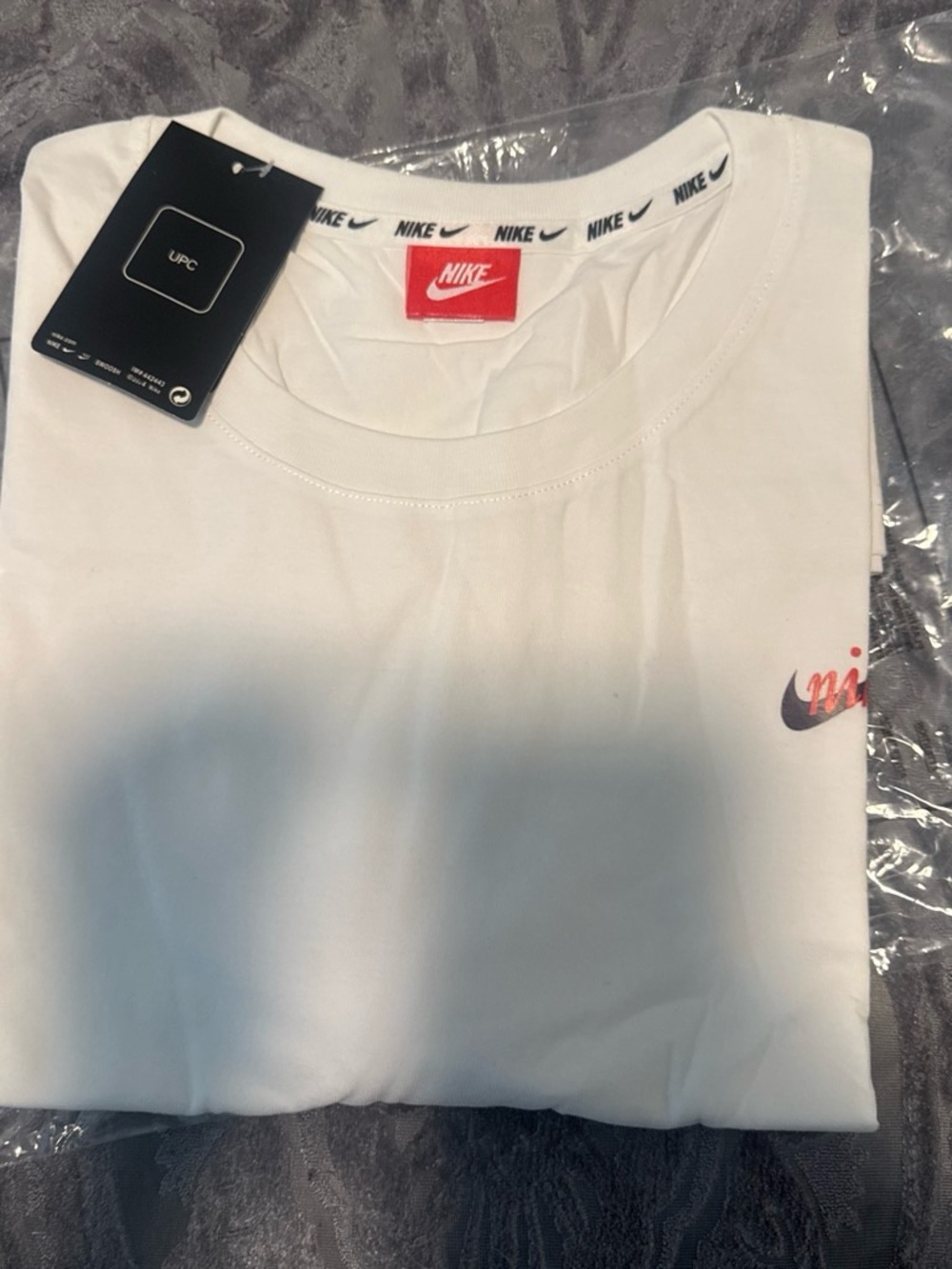 Nike White Short Sleeve Tee with Small Script Swoosh